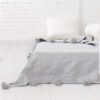 Elevate Your Space with Handwoven Moroccan Pom Pom Throw - A Timeless Blend of Comfort and Bohemian Elegance - Image 2