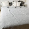 Elevate Your Space with Handwoven Moroccan Pom Pom Throw - A Timeless Blend of Comfort and Bohemian Elegance - Image 3