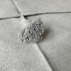 Elevate Your Space with Handwoven Moroccan Pom Pom Throw - A Timeless Blend of Comfort and Bohemian Elegance - Image 5