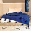 Elevate Your Space with Handwoven Moroccan Pom Pom Throw - A Timeless Blend of Comfort and Bohemian Elegance